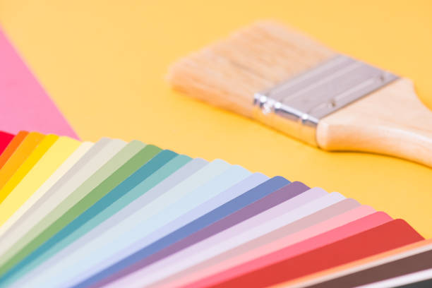 istock Color palette and brush on yellow-pink background 1167490893