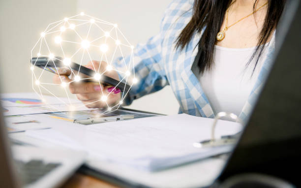 istock Women working touch screen smartphone business graph analysis technology 1167493967