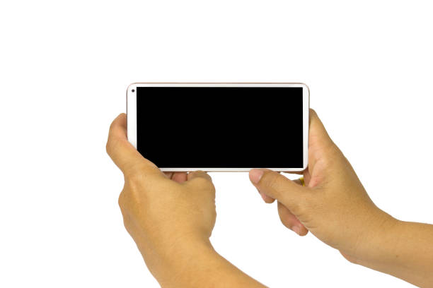 istock close-up hand holding white mobile phone with blank black screen on white background with cipping path. 1167494259