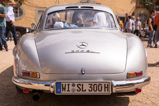 Jüchen, Germany - August 2019. Rear view of a silver grey Mercedes 300SL Gullwing at Classic Days, Schloss Dyck, Germany.