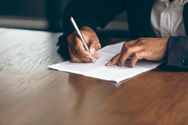istock businessman check the work documents in office,The media reaches the operational guidelines 1167498534