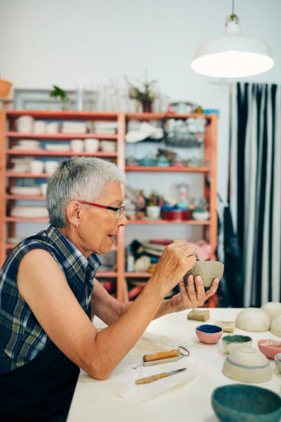 istock Senior Woman Enjoy In Ceramics Workshop 1167498619