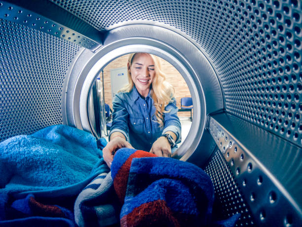 istock Young woman having a laundry day 1167498711
