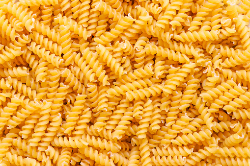Fusilli spaghetti pattern background.