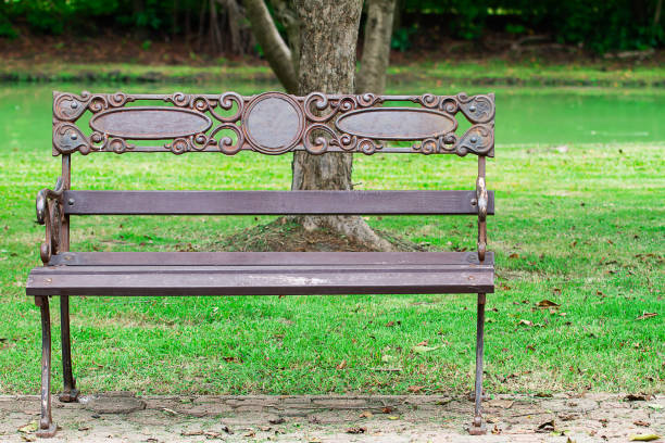 istock Old vintage bench in the park 1167505482