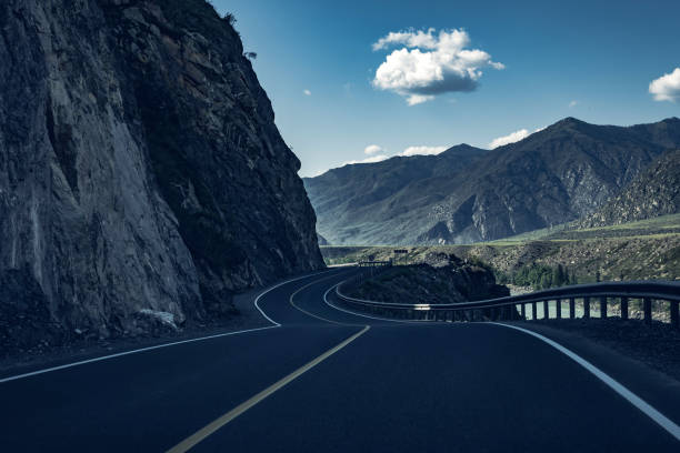 istock winding and dangerous road in the mountains 1167507157