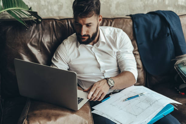istock Bearded handsome businessman on coffee break 1167507273