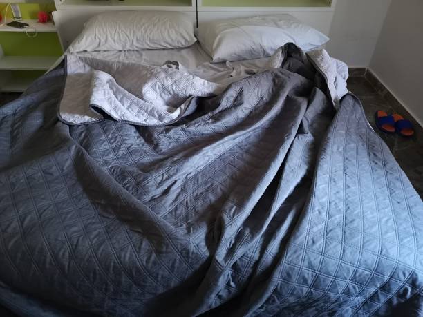 istock empty and unmade bed in the morning 1167511314