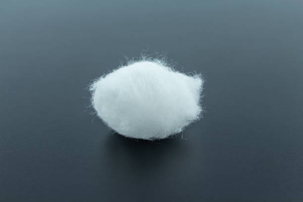 cotton ball white soft clean beauty health medicine on black background. cotton ball white soft clean beauty health medicine on black background. cotton ball stock pictures, royalty-free photos & images
