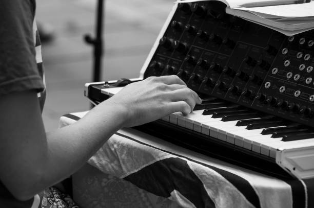 istock hand of musician on synthesizer keyboard 1167513631