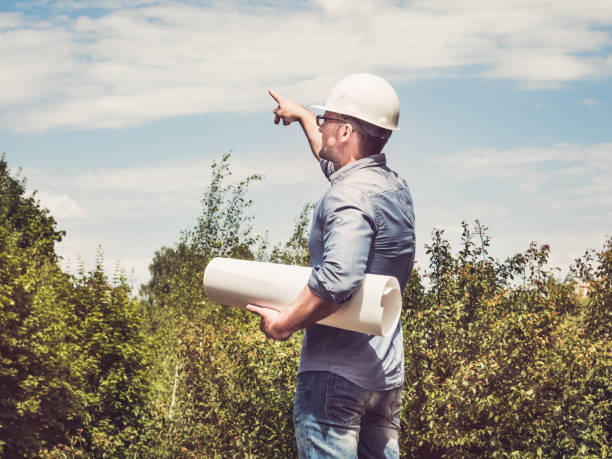 istock Man holding paper project in the park 1167514305