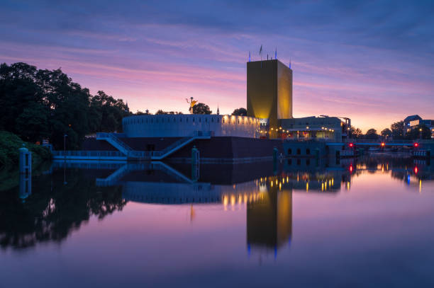 GRONINGEN - THE NETHERLANDS, August 9, 2019: the Groninger Museum during a colorful dawn in Groningen.