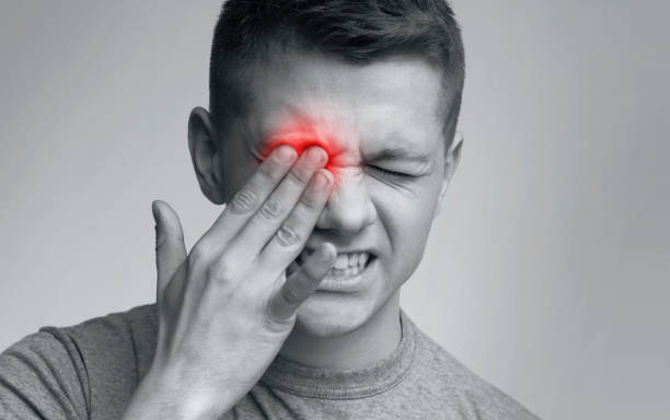 istock Tired exhausted man suffering from strong eye pain 1167515868