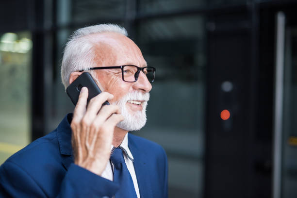 istock Happy senior businessman talking on phone. 1167517715