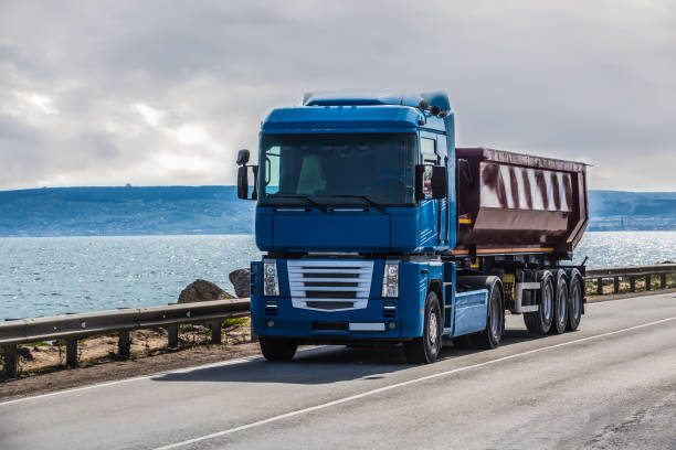 istock Truck is moving along the road 1167520092