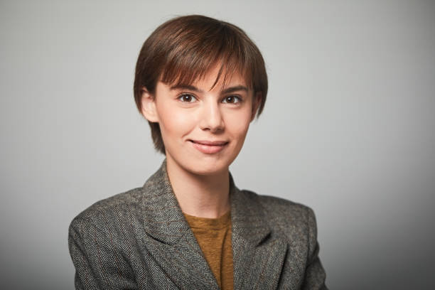 istock New business head shot portrait on plain background. 1167520767