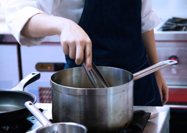 istock Chef cooking food in the kitchen, Chef preparing food 1167526963