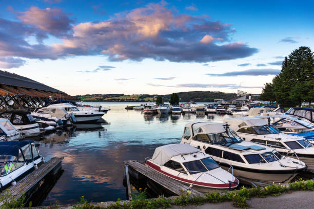 motor yachts in the port at sunset