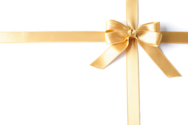 istock Golden ribbon with bow isolated on white background. Gift concept 1167528159