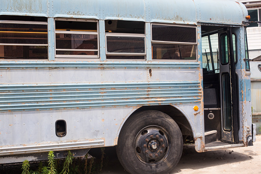 Broken Down and Abandoned Bus Side View