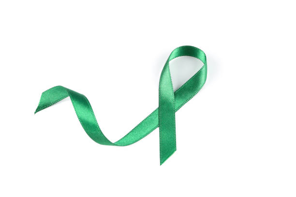 istock Green awareness ribbon isolated on white background 1167528232