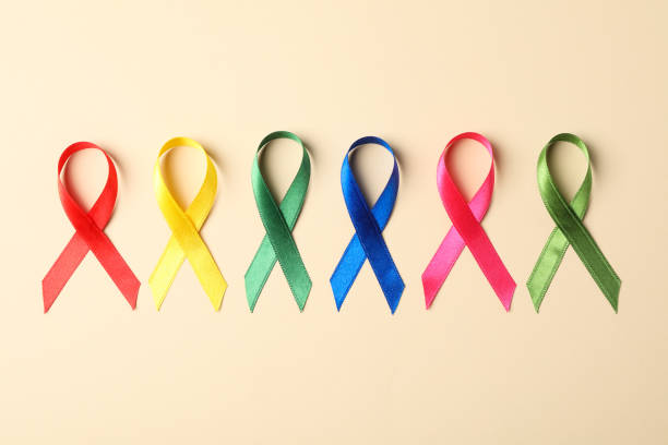 istock Flat lay composition with awareness ribbons on color background, space for text. 1167529977