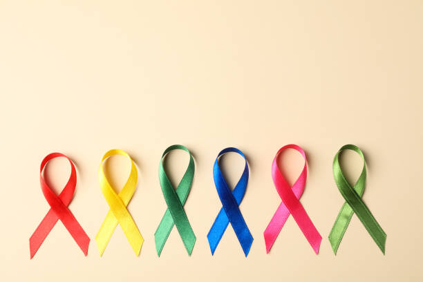 istock Flat lay composition with awareness ribbons on color background, space for text. 1167529992