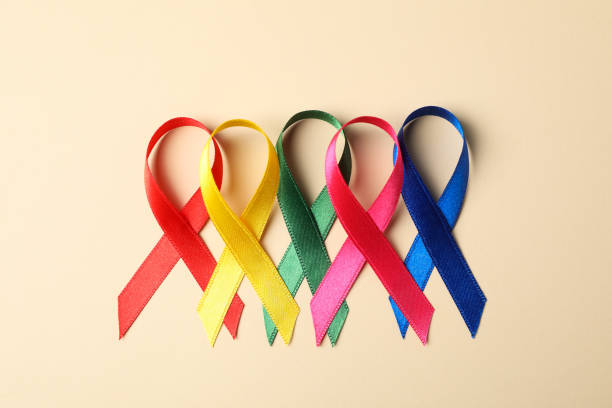 istock Flat lay composition with awareness ribbons on color background, space for text. 1167530083