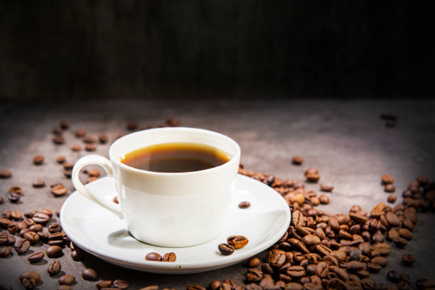 istock The cup of hot coffee with coffee beans 1167530569