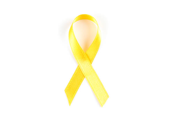 Yellow awareness ribbon isolated on white background