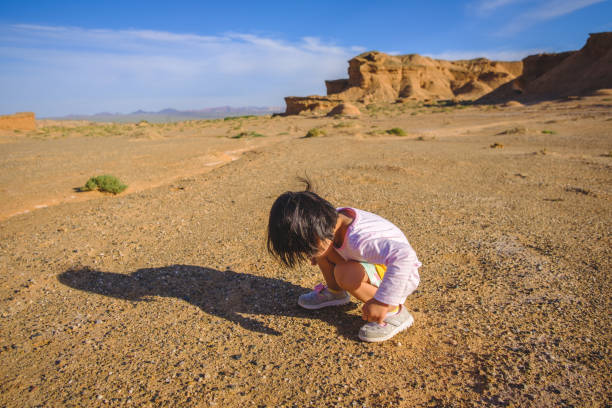 istock A Asian girl paly in Danxia landform 1167533403