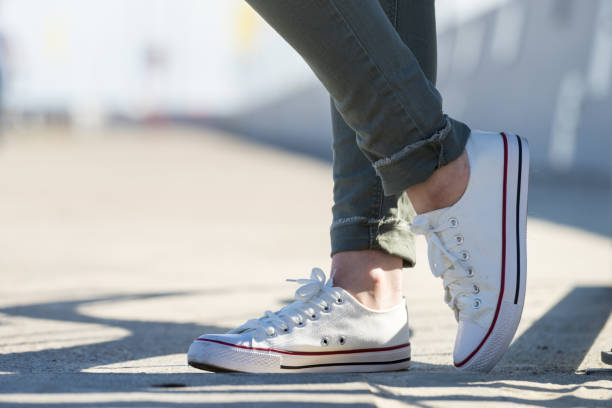 istock Woman wearing white sneakers 1167534595