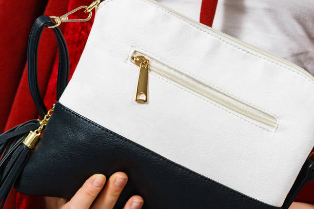 istock Girl holding handbag. 1167534952
