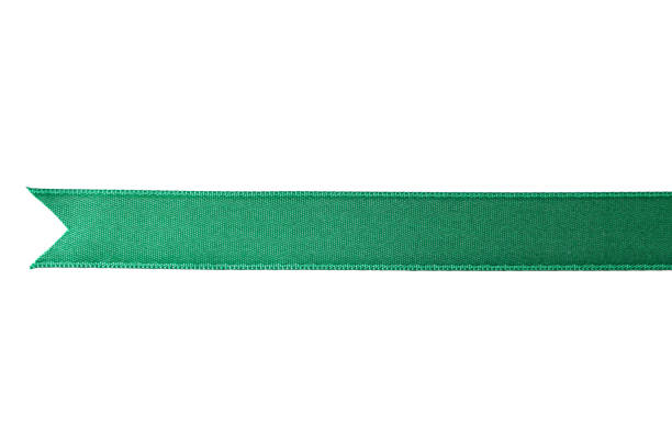 istock Green ribbon isolated on white background. Gift concept 1167538311