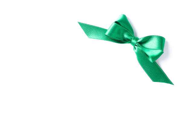 istock Green bow isolated on white background. Gift concept 1167538897