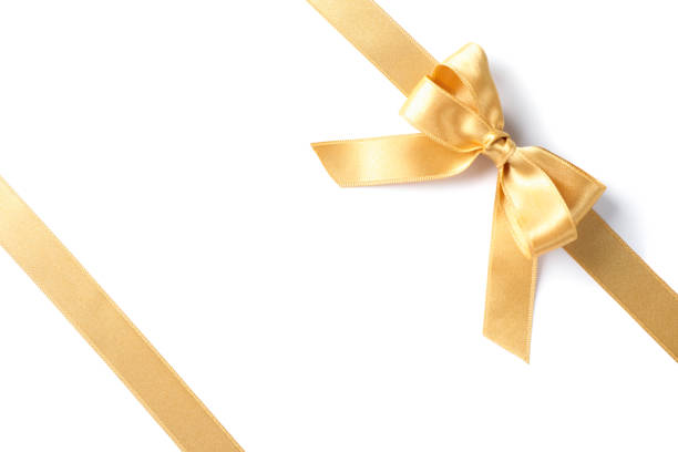 istock Golden ribbons with bow isolated on white background. Gift concept 1167538994