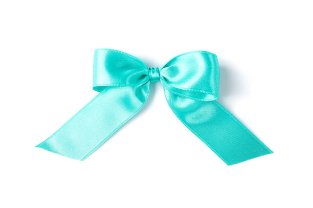 istock Turquoise bow isolated on white background. Gift concept 1167539011