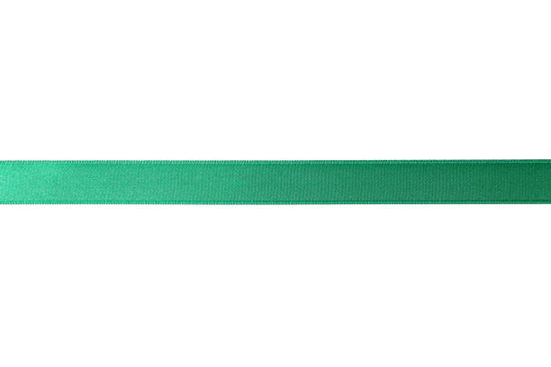 istock Green ribbon isolated on white background. Gift concept 1167539199