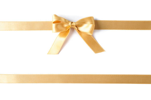 istock Golden ribbons with bow isolated on white background. Gift concept 1167539246