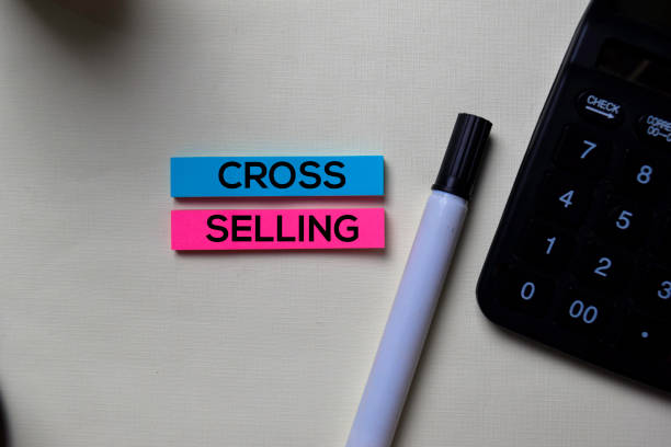 Cross-Selling text on sticky notes isolated on office desk stock photo