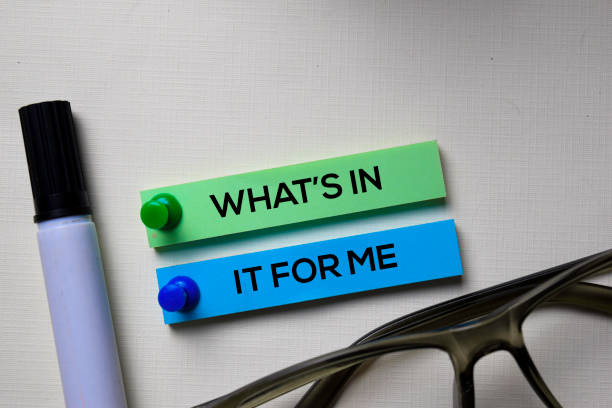 istock What's In It For Me text on sticky notes isolated on office desk 1167539534