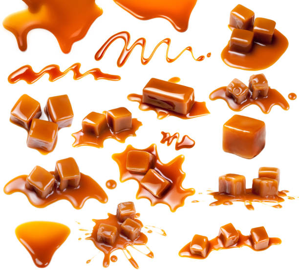Caramel candies Isolated. Caramel pieces with  sauce on a white background, set. Collection of Sweet Butterscotch toffee Caramel candies Isolated. Caramel pieces with  sauce on a white background, set. Collection of Sweet Butterscotch toffee caramel photos stock pictures, royalty-free photos & images