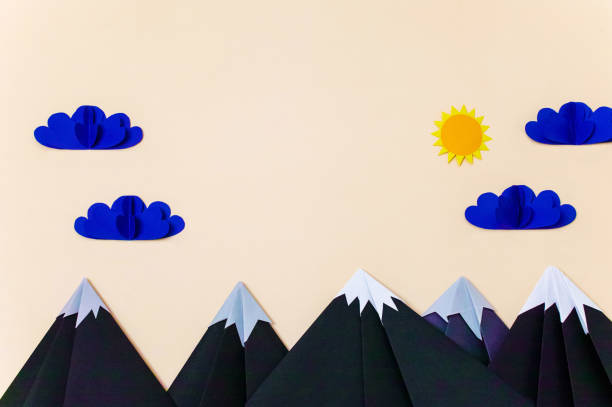 istock Origami mountain landscape with 3d clouds and sun. Creative composition for banner/landing page/background. 1167540816