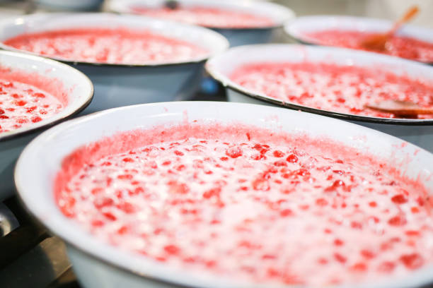 istock Strawberry jam cooking process. Organic traditional jam manufacturing. 1167540928