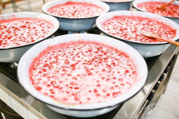 istock Strawberry jam cooking process. Organic traditional jam manufacturing. 1167542393