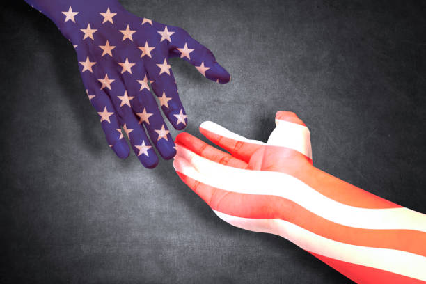 istock Hands of people posing helps with American flag 1167549867