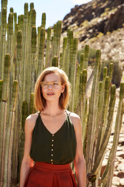 istock Glasses girl in desert 1167549911