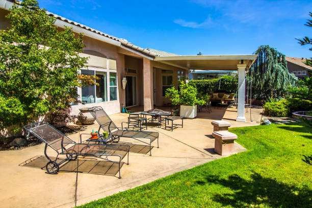 istock Lounge Chairs And Fire Pit In Rear Yard Patio 1167550447