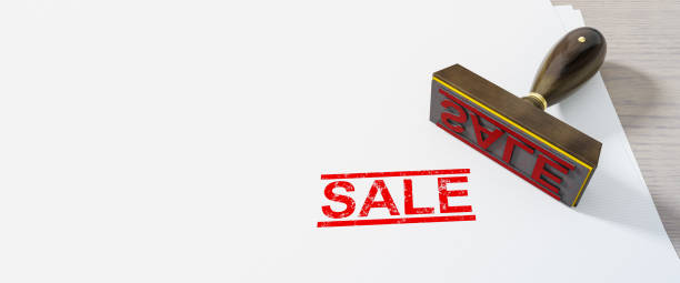 istock red stamp sale on white paper background 1167551581