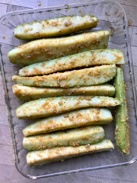 istock Baked Zucchini Courgettes Stuffed with Sesame, Garlic and Butter. 1167553697